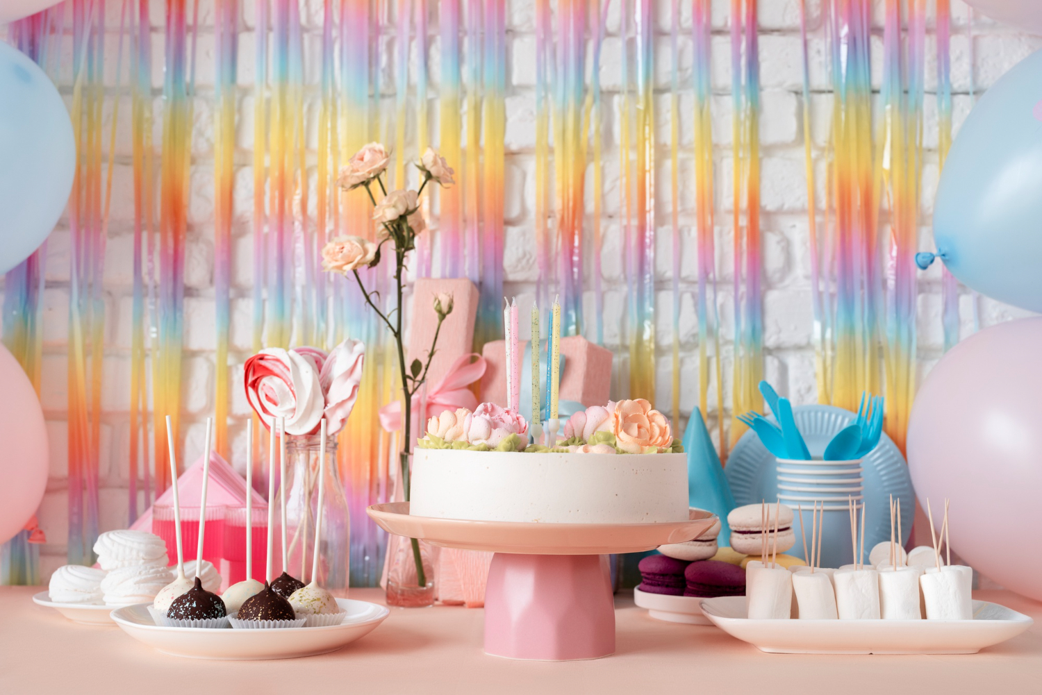 Celebrate in style with our Desert Rose Baby Shower Ideas! This colorful image features balloons, cake, and candy for a festive birthday party