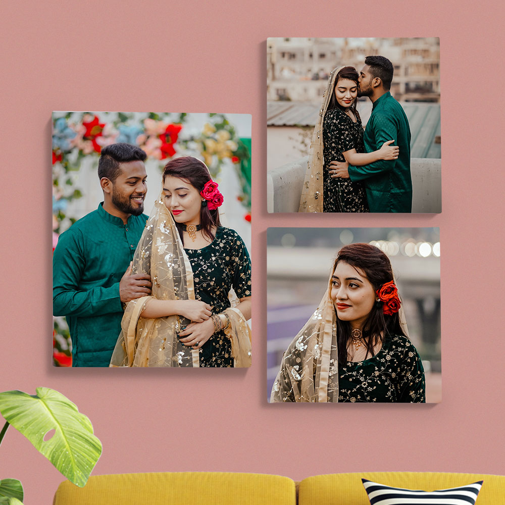 A charming wall display featuring three adorable pictures of a couple, perfect for adding a touch of love and warmth to any baby shower decor.