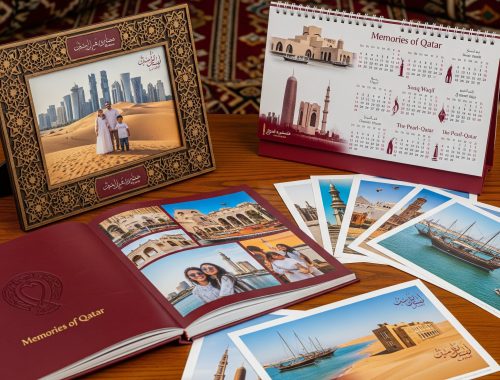 A vibrant, Qatar-themed collection of personalized photo gifts arranged on a wooden table.